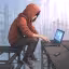 A computer programmer on his laptop in a building site