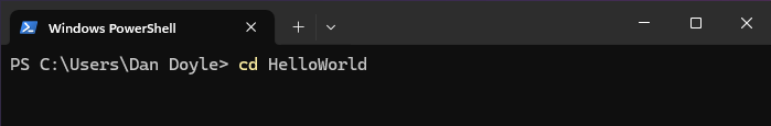 A screenshot of a terminal showing changing directory to a our newly created hello world C# project
