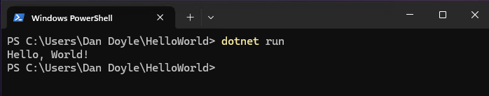 A screenshot of a terminal showing running our newly created hello world C# project